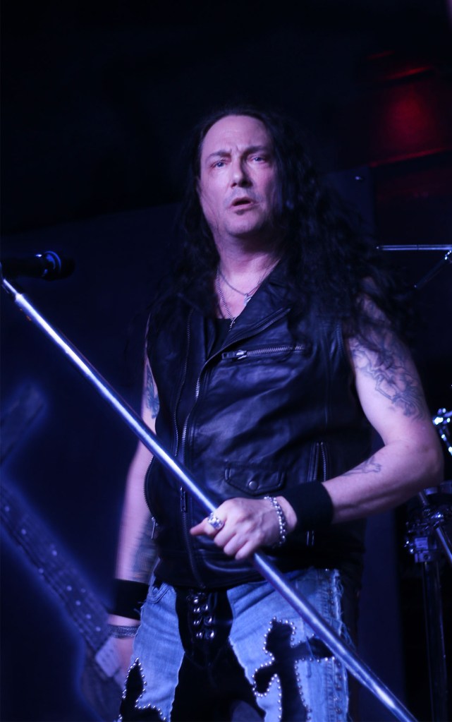 02182014 - Metal Church singer Ronny Munroe (cq), 48, interacts with the crowd during the band's show in Tempe, Ariz. Tuesday night. Photo by Alec Damiano / JMC 351