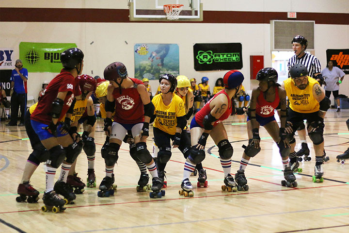 03222014 - The ASU Derby Devils and UA Derby Cats prepare to compete in a new round during a match in Mesa, Ariz. ASU beat the Derby Cats, 261-102. Photo by Alec Damiano / JMC 351