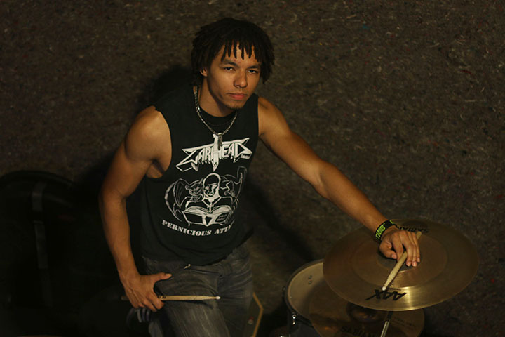 03102014 - Dane White (cq), 21, of Gilbert, Ariz., poses with his drum set. He is the drummer of Tempe speed metal band Warhead. Photo by Alec Damiano / JMC 351