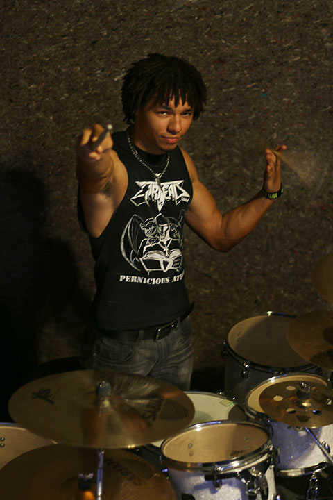 03102014 - Dane White (cq), 21, of Gilbert, Ariz., poses with his drum set. He is the drummer of Tempe speed metal band Warhead. Photo by Alec Damiano / JMC 351